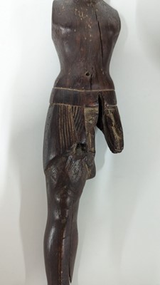 Lot 252 - An ancient Egyptian carved wooden figure in the Middle Kingdom-style