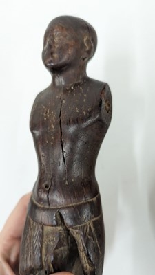 Lot 252 - An ancient Egyptian carved wooden figure in the Middle Kingdom-style