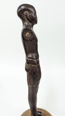 Lot 252 - An ancient Egyptian carved wooden figure in the Middle Kingdom-style