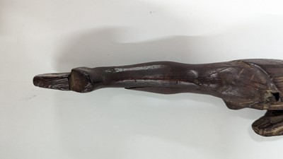 Lot 252 - An ancient Egyptian carved wooden figure in the Middle Kingdom-style
