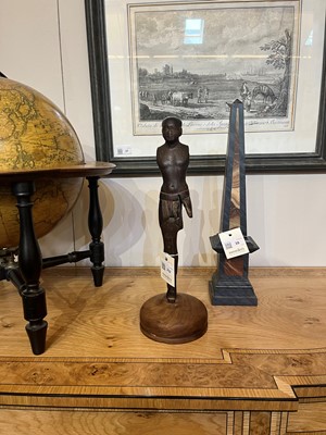Lot 252 - An ancient Egyptian carved wooden figure in the Middle Kingdom-style