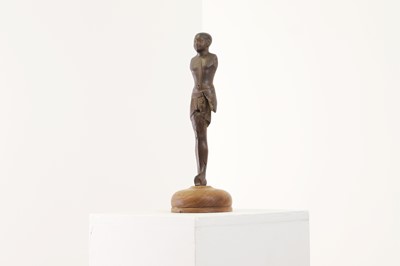 Lot 252 - An ancient Egyptian carved wooden figure in the Middle Kingdom-style