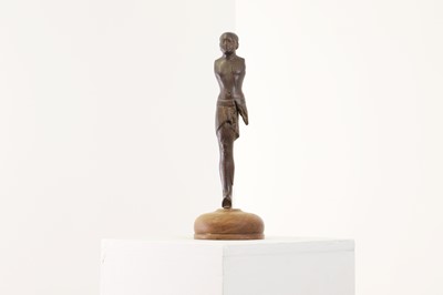 Lot 252 - An ancient Egyptian carved wooden figure in the Middle Kingdom-style