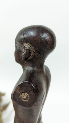 Lot 252 - An ancient Egyptian carved wooden figure in the Middle Kingdom-style