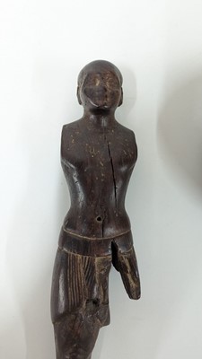 Lot 252 - An ancient Egyptian carved wooden figure in the Middle Kingdom-style