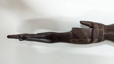Lot 252 - An ancient Egyptian carved wooden figure in the Middle Kingdom-style
