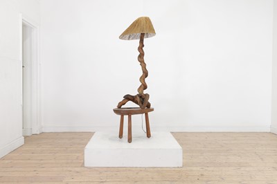 Lot 453 - A rootwood and elm floor lamp occasional table