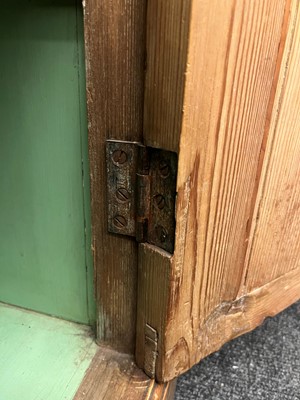 Lot 3 - A George II-style carved pine breakfront side cabinet