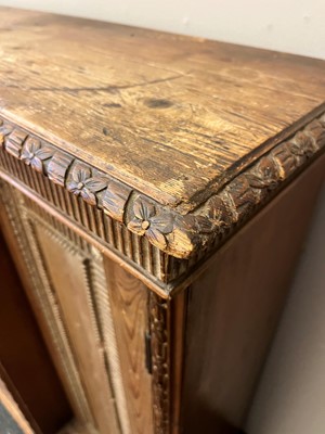 Lot 3 - A George II-style carved pine breakfront side cabinet