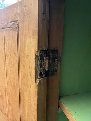 Lot 3 - A George II-style carved pine breakfront side cabinet