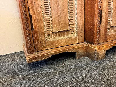 Lot 3 - A George II-style carved pine breakfront side cabinet