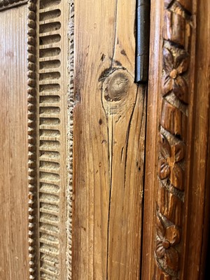 Lot 3 - A George II-style carved pine breakfront side cabinet