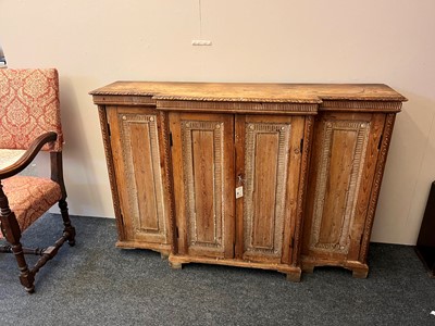 Lot 3 - A George II-style carved pine breakfront side cabinet