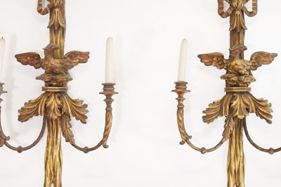 Lot 40 - A pair of George III-style carved giltwood wall sconces