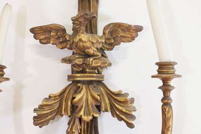 Lot 40 - A pair of George III-style carved giltwood wall sconces