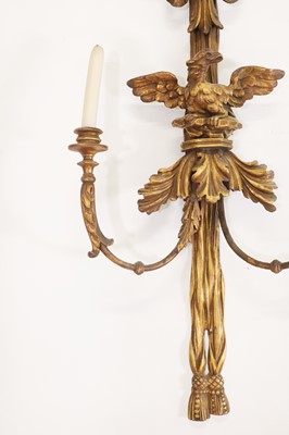 Lot 40 - A pair of George III-style carved giltwood wall sconces