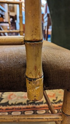 Lot 51 - Two Regency faux bamboo painted open armchairs