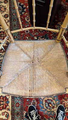 Lot 51 - Two Regency faux bamboo painted open armchairs