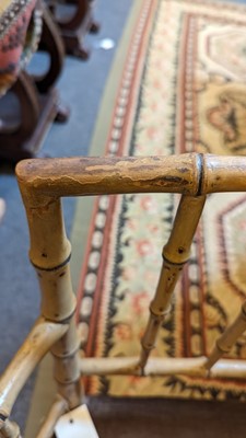 Lot 51 - Two Regency faux bamboo painted open armchairs