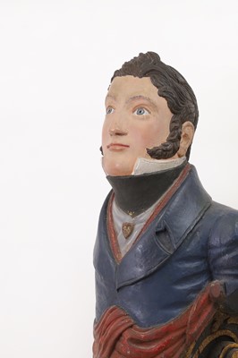 Lot 64 - A carved and painted figurehead