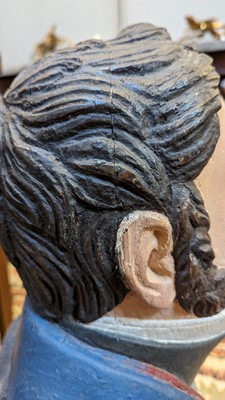 Lot 64 - A carved and painted figurehead