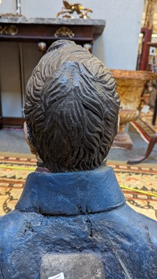 Lot 64 - A carved and painted figurehead