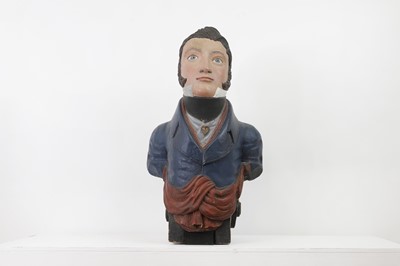 Lot 64 - A carved and painted figurehead