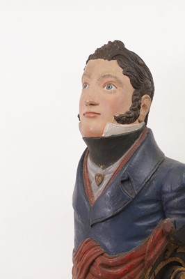 Lot 64 - A carved and painted figurehead
