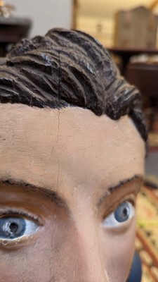Lot 64 - A carved and painted figurehead