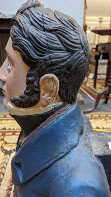 Lot 64 - A carved and painted figurehead