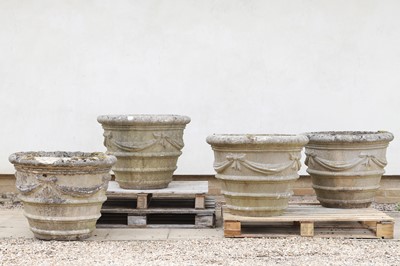 Lot 69 - Four large composite stone planters