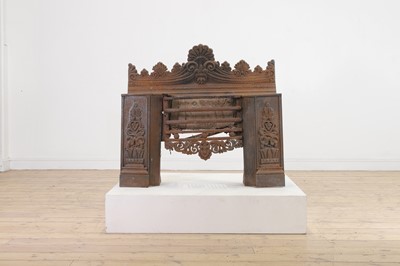 Lot 28 - A Regency cast iron fire grate in the manner of George Bullock