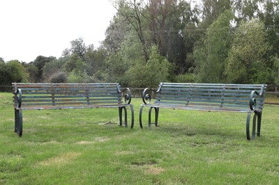 Lot 513 - A pair of cast metal benches
