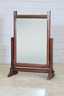Lot 8 - An Arts and Crafts oak dressing mirror