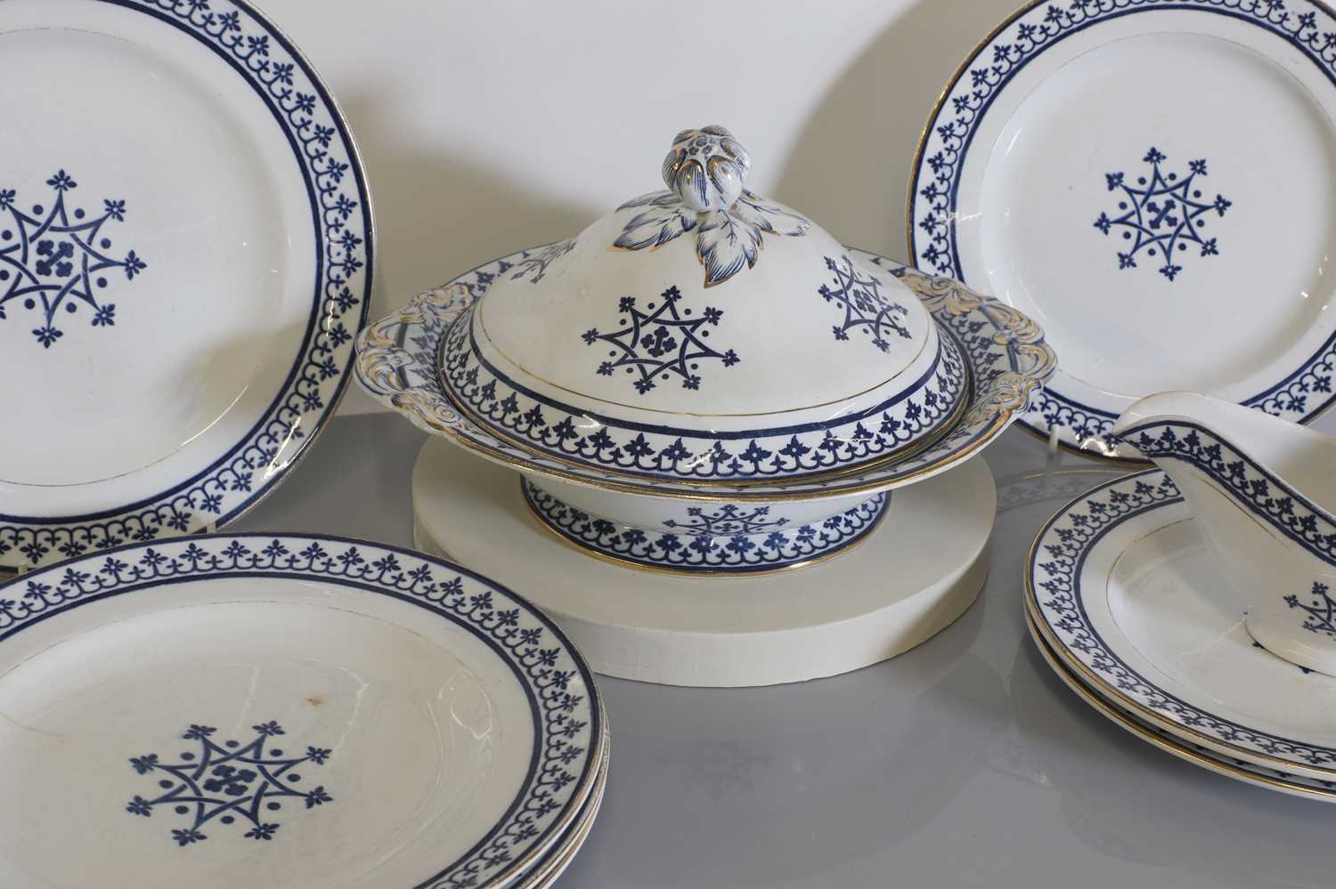 Lot 9 - A 'Gothic' pattern part dinner service
