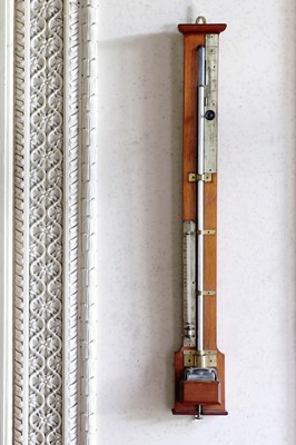 Lot 422 - ☘ A walnut-framed stick barometer by C W Dixey & Son