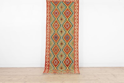 Lot 466 - A kilim wool runner