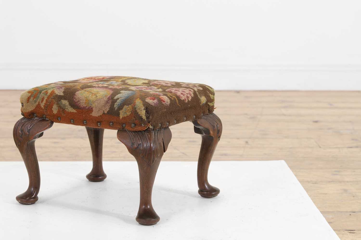 Lot 83 - A small George II mahogany stool