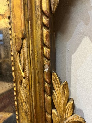 Lot 401 - A carved giltwood pier mirror