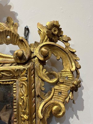 Lot 401 - A carved giltwood pier mirror