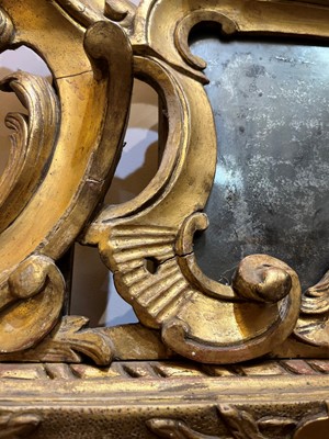 Lot 401 - A carved giltwood pier mirror