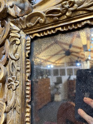 Lot 401 - A carved giltwood pier mirror