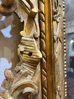 Lot 401 - A carved giltwood pier mirror