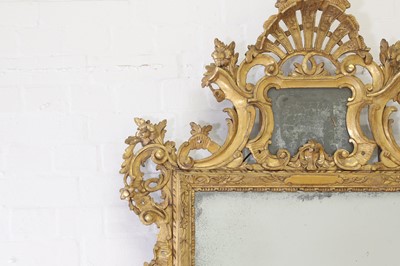Lot 401 - A carved giltwood pier mirror