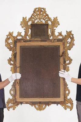 Lot 401 - A carved giltwood pier mirror