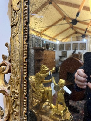 Lot 401 - A carved giltwood pier mirror