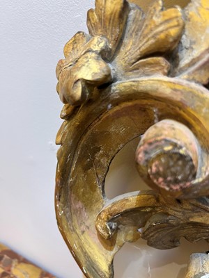 Lot 401 - A carved giltwood pier mirror