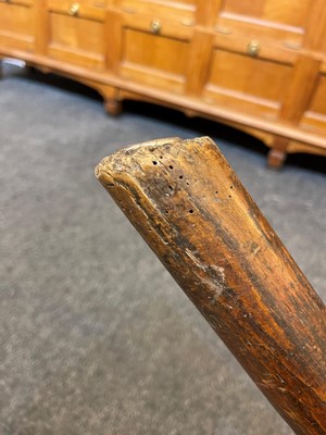 Lot 356 - A large ash and elm comb-back Windsor armchair