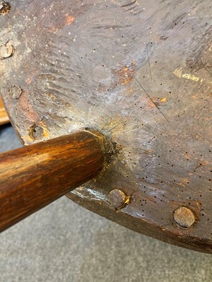 Lot 356 - A large ash and elm comb-back Windsor armchair