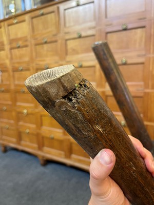 Lot 356 - A large ash and elm comb-back Windsor armchair